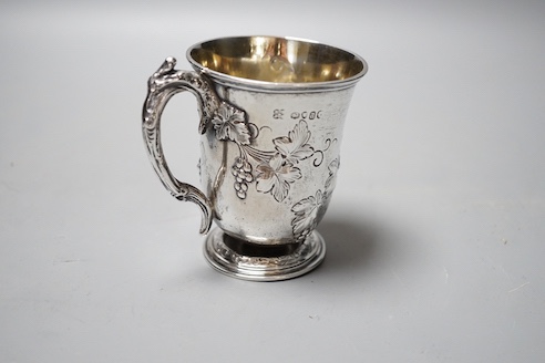 A Victorian embossed silver christening mug, Edward & John Barnard, London, 1856, 9cm, 149 grams.